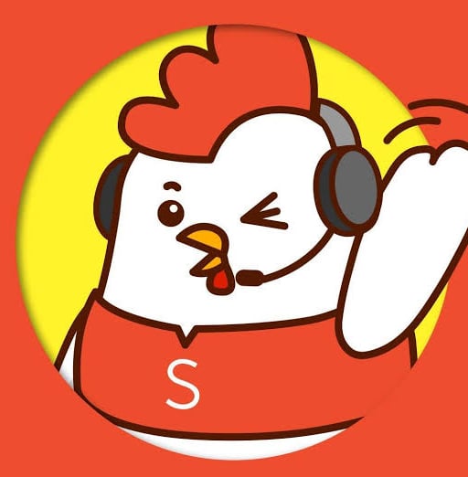 Chicken cartoon character wearing headset and red shirt with S logo on orange background with yellow circle behind
